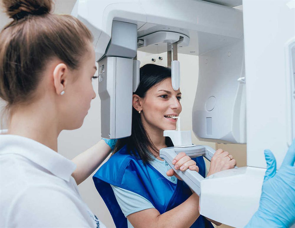 Panoramic dental X-ray being taken at White Dent